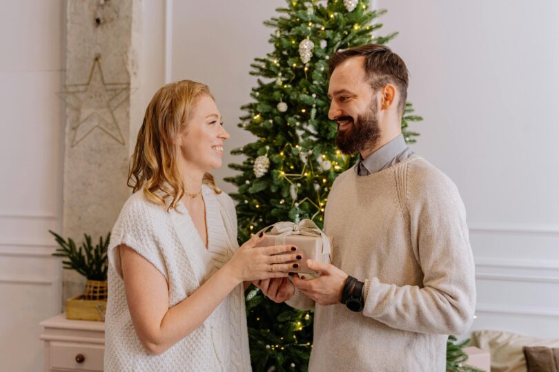 Man giving a gift to a woman