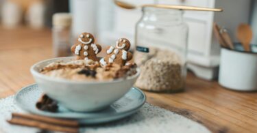 Gingerbread man in a bowl and plate stock